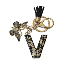 brelok-z-litera-v-elegancki-czarny-design-z-motylem