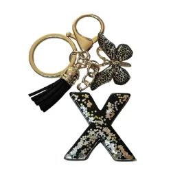 brelok-z-litera-x-elegancki-czarny-design-z-motylem