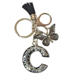 brelok-z-litera-c-elegancki-czarny-design-z-motylem