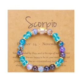 bransoletka-znak-zodiaku-scorpio-skorpion-niebieskimi-koralikami-elastyczna