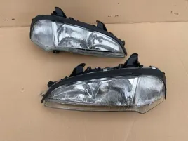 opel-tigra-94-reflektory-lampy-przednie-kpl