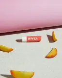 nivea-pomadka-ochronna-do-ust-peach-shine-marka-nivea