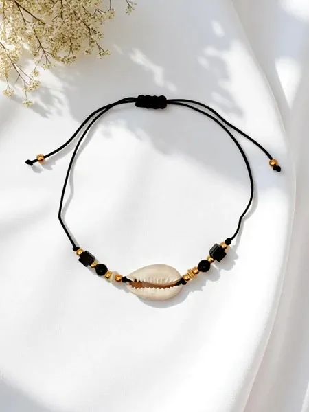 Bransoletka damska z muszelką Oceania Grace Royalfashion 29XSL-03/23G czarne