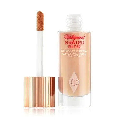 Pojedynczy rozświetlacz w płynie Charlotte Tilbury złoty 3 FAIR PALE