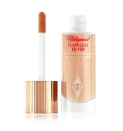 pojedynczy-rozswietlacz-w-plynie-charlotte-tilbury-zloty-3-fair-pale