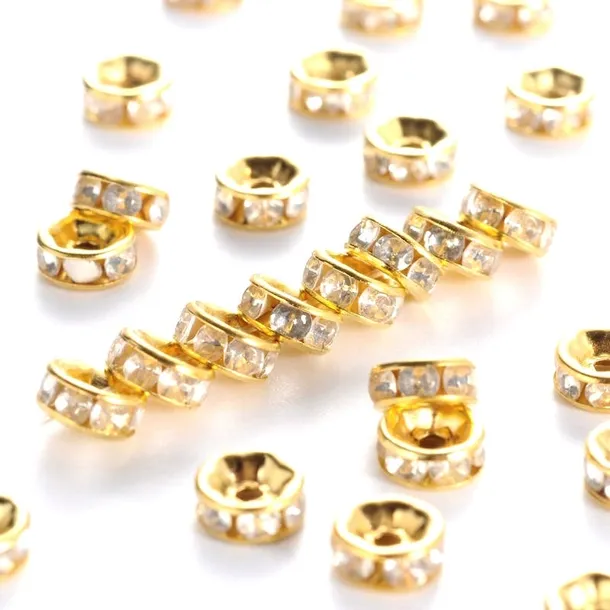 PRZEKŁADKI Z CYRKONIAMI CRYSTAL ZŁOTE 6mm 50szt CYRKONIE OZDOBY ŚWIĘTA