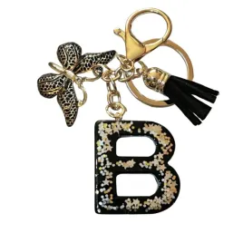 brelok-z-litera-b-elegancki-czarny-design-z-motylem
