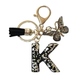brelok-z-litera-k-elegancki-czarny-design-z-motylem