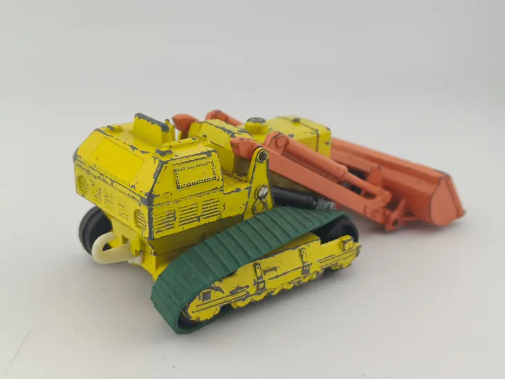 matchbox-king-size-caterpillar-traxcavator-stan-nowy