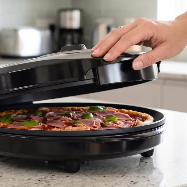 piec-do-pizzy-mini-piekanik-32cm-opiekacz-1450w-st1000-eldom-glebokosc-produktu-32-5-cm