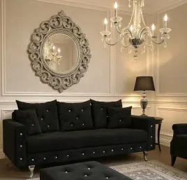 kanapa-glamour-czarna-sofa-na-wysokich-ozdobnych-nozkach-z-krysztalkami