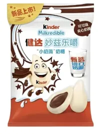 kinder-milkredible-mleczne-kropelki-z-nadzieniem-kakaowym