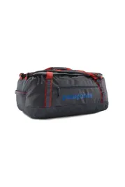 torba-black-hole-duffel-55l-smolder-blue-w-amanita-red-patagonia