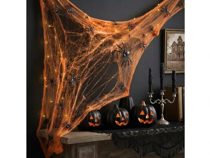 dekoracja-pajeczyna-siec-pajecza-60-g-pomaranczowa-halloween-stan-nowy