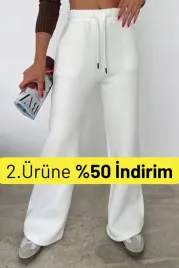 biale-dresowe-spodnie-z-szeroka-nogawka-i-kieszeniami-s-5ia