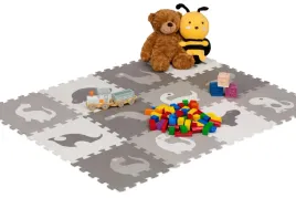 mata-do-zabawy-z-puzzli-z-motywem-dinozaurow-szaro-biala