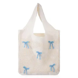 torba-plazowa-z-siateczki-33x38-cm-bezowa-niebieskie-kokardy-na-ramie