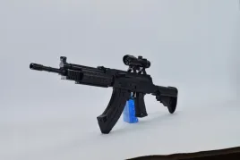 karabin-pistolet-asg-na-kulki-6-mm-bb-z-celownikiem-laserowym-zestaw-5-szt