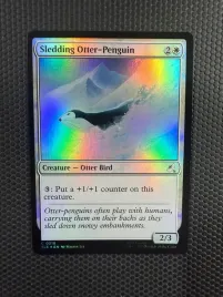karta-magic-the-gathering-sledding-otter-penguin-foil-tle-218