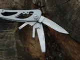 multitool-texar-narzedzia-otwieracz-do-puszek-pilnik-pila-szczypce-srubokret-plaski
