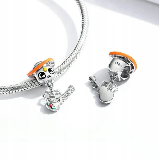 gnoce-charms-skeleton-man-playing-guitar-stan-nowy