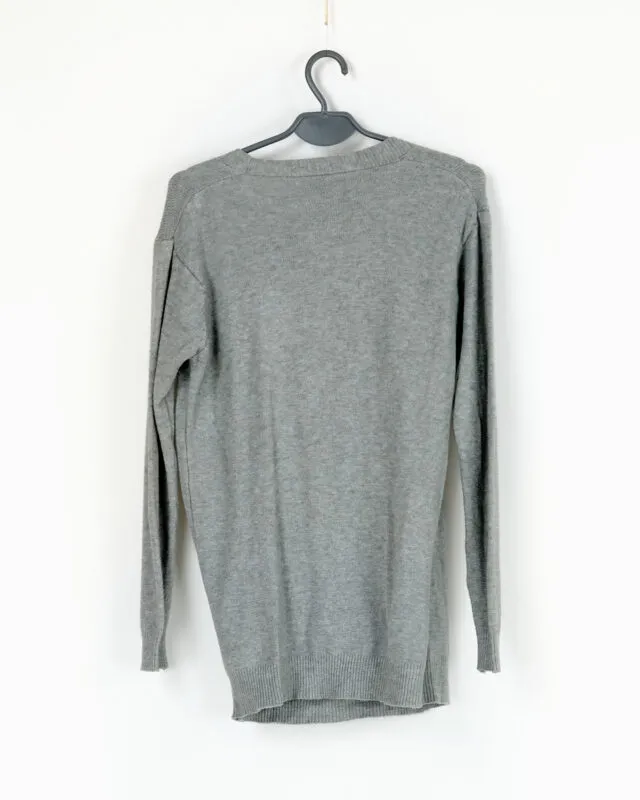 sweter-z-duzym-dekoldem-stan-nowy