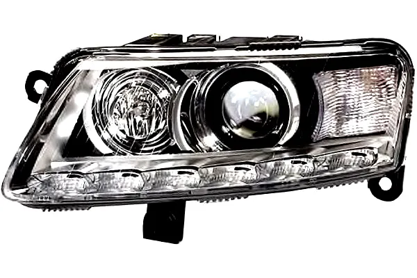 reflektor-audi-a6-04-le-hella-stan-nowy