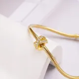 gnoce-separator-x-shape-gold-stan-nowy