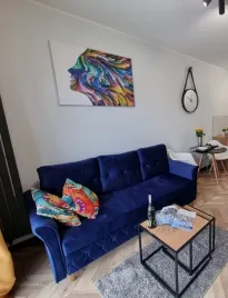 kanapa-rozkladana-lozko-z-funkcja-spania-sofa-skandynawska-pojemnik