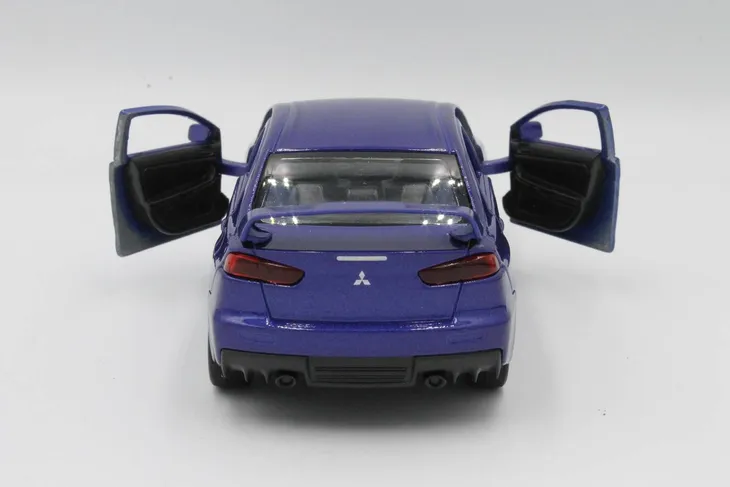 model-metalowy-welly-mitsubishi-lancer-evolution-x-stan-nowy-bohater-brak