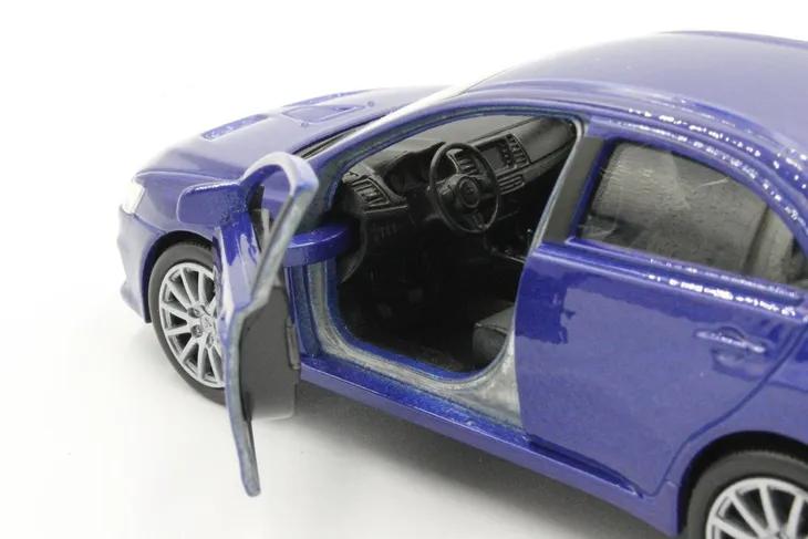 model-metalowy-welly-mitsubishi-lancer-evolution-x-stan-nowy-material-inny