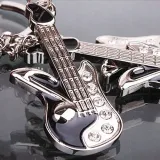 brelok-muzyka-gitara-prezent-gadzet-marka-gadget-master-stan-nowy