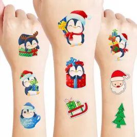 najlepsze-swiateczne-tatuaze-pingwinki-prezenty-sanki-choinka-prezent