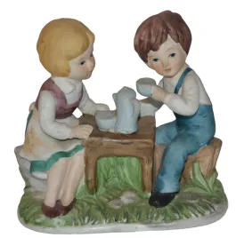 porcelana-biskwit-chlopiec-i-dziewczynka-sniadanie
