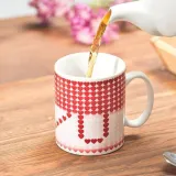 magiczny-kubek-ceramiczny-serduszka-stan-nowy