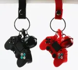 brelok-gamera-z-dzwonkiem-czerwony-waga-z-opakowaniem-0-15-kg