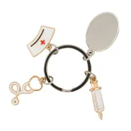 brelok-eskulap-srebrny-czepek-pielegniarski-stetoskop-i-strzykawka