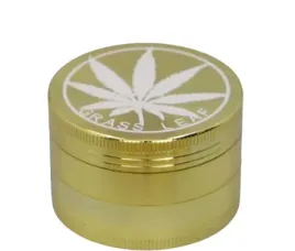 zloty-crusher-mlynek-do-tytoniu-grinder-metalowy-z-napisem-grass-leaf
