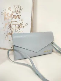 salvadore-feretti-skorzana-torebka-kopertowka-light-blue