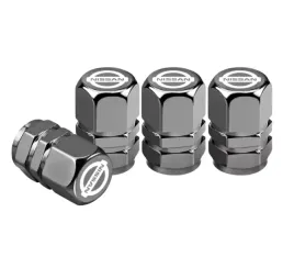 nowoczesne-szare-nakretki-na-wentyle-do-nissan-z-logo-nissan-trwale-solidne