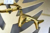 breloczek-mosiezny-delfin-material-dominujacy-metal