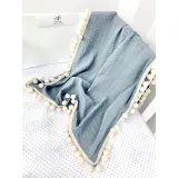 koc-muslinowy-pompony-100x75-grey