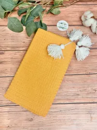 koc-wafelek-bawelniany-pompony-100x75-mustard