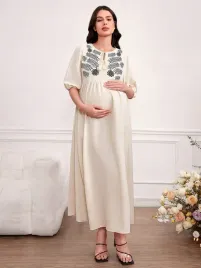 shein-kremowa-sukienka-ciazowa-z-ozdobnym-czarnym-haftem-a-line-l-80023