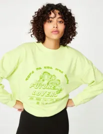 jennyfer-jasnozielona-bluza-z-nadrukiem-future-lovers-xs-37000