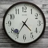 zegar-scienny-rhythm-cmg430nr06-50-cm-stan-nowy