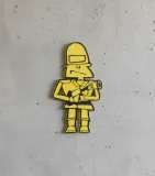 kapitan-bomba-figura-scienna-3d-zolty