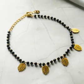 bransoletka-na-noge-liscie-monstery-czarne-koraliki-stal-chirurgiczna-316l