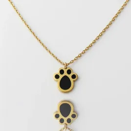 naszyjnik-blackpaw-zloty-czarna-lapka-psa-kota-emaliowana-stal-pvd-prezent