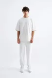 meskie-spodnie-dresowe-jogger-relaxed-basic-ecru-l-stan-nowy